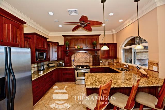 Kitchen with Granite Counter Tops and Solid Wood Cabinets